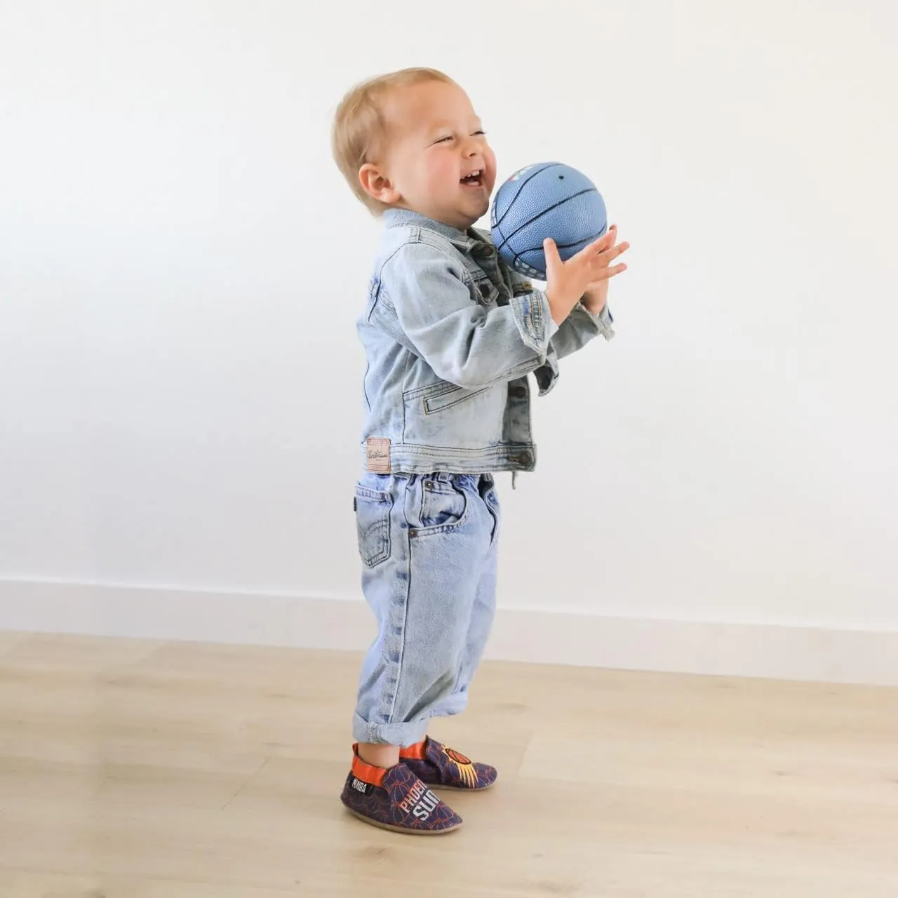Robeez Baby Boys and Girls NBA Basketball Team Soft Soles Slip-Resistant Crib Shoes Slippers for Infant and Toddler, 0-24 Months